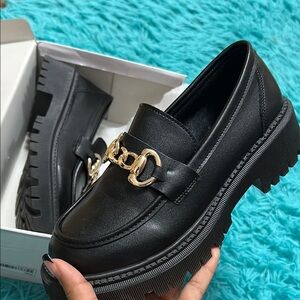 Black Chunky Loafers with Gold Chain Detail